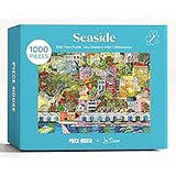 Seaside-themed puzzle packaging with colorful illustration of a coastal scene.