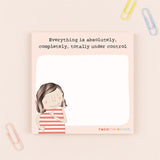 Note with illustration of a person and text 'Everything is absolutely, completely, totally under control' on a pink background.